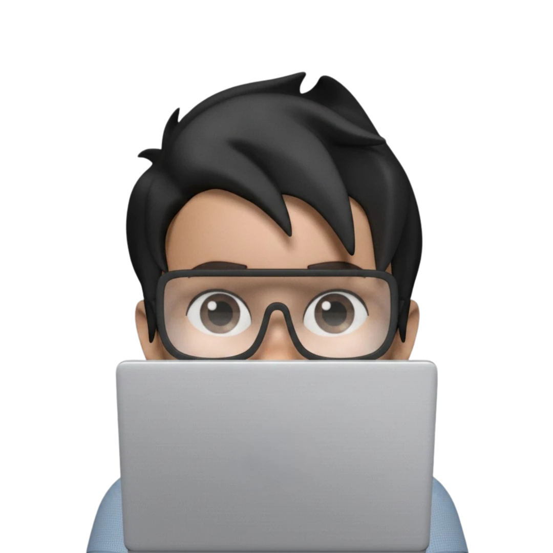 Vishal peeking over a laptop